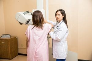 woman getting a mammogram