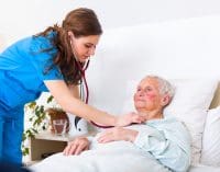 Nurse with a patient at a nursing home