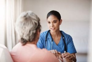 Nurse supporting patient