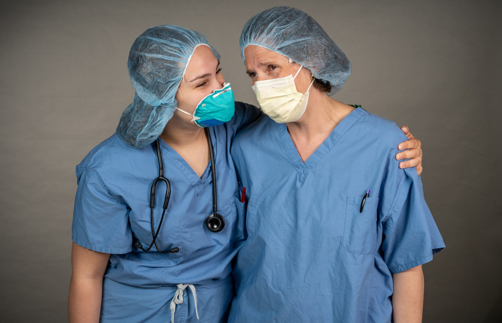 Two nurses practicing reverse mentoring